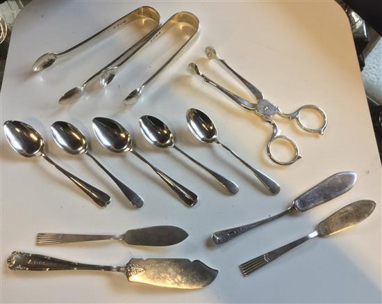 Small silver - 3 butter knives, 2 tongs, a pair of nips and other spoons